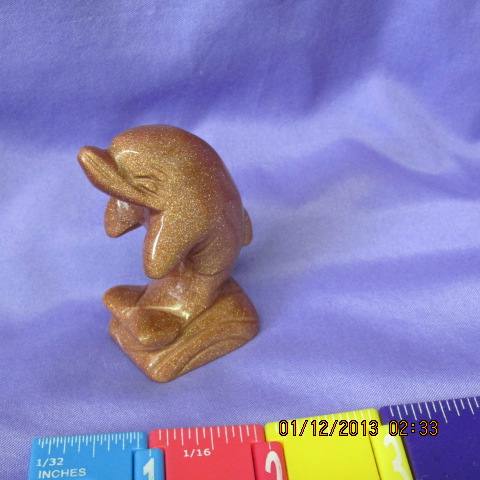 Goldstone Dolphin on Tail